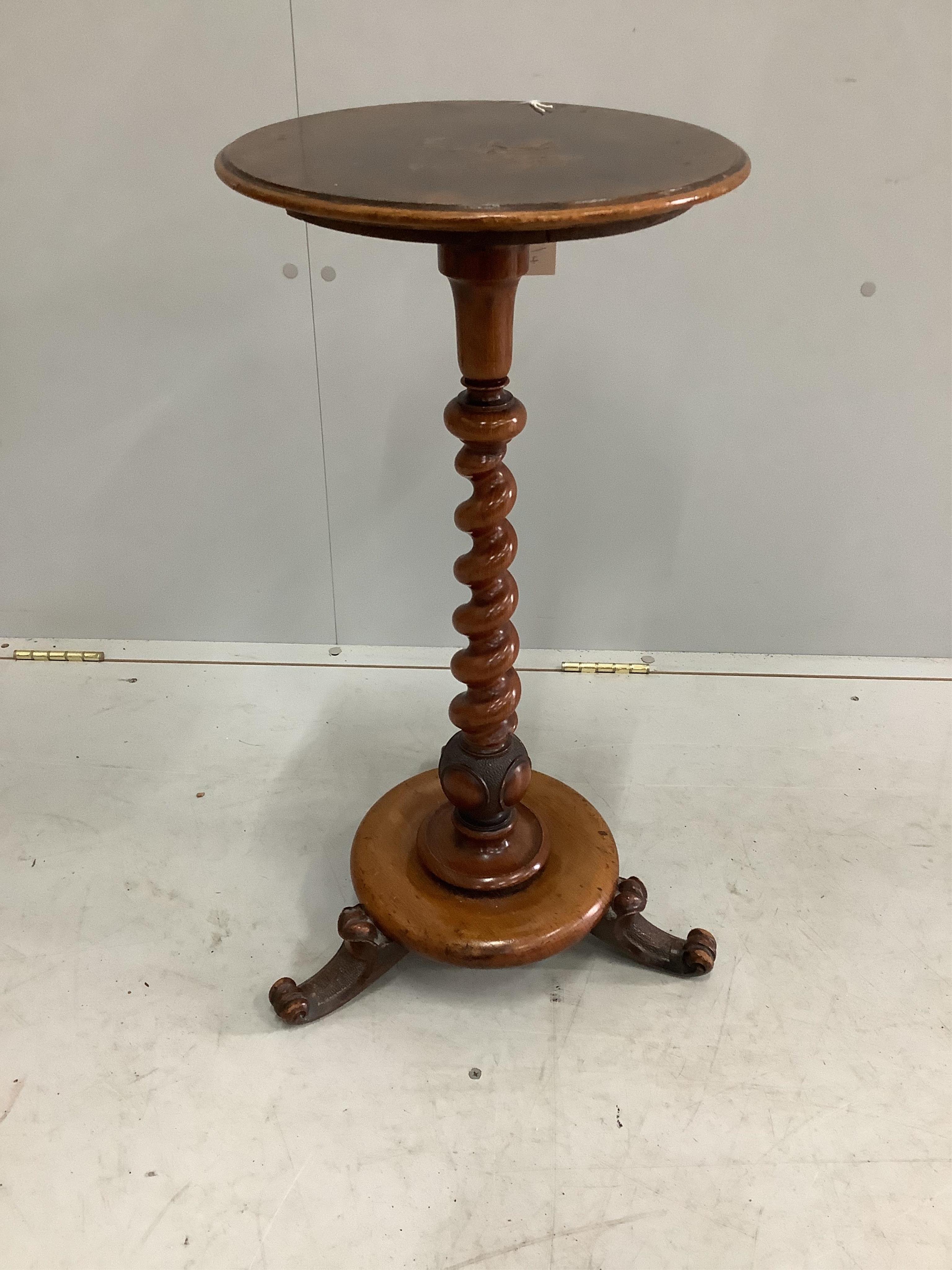 A Victorian walnut twisted stem candlestand, diameter 33cm, height 67cm